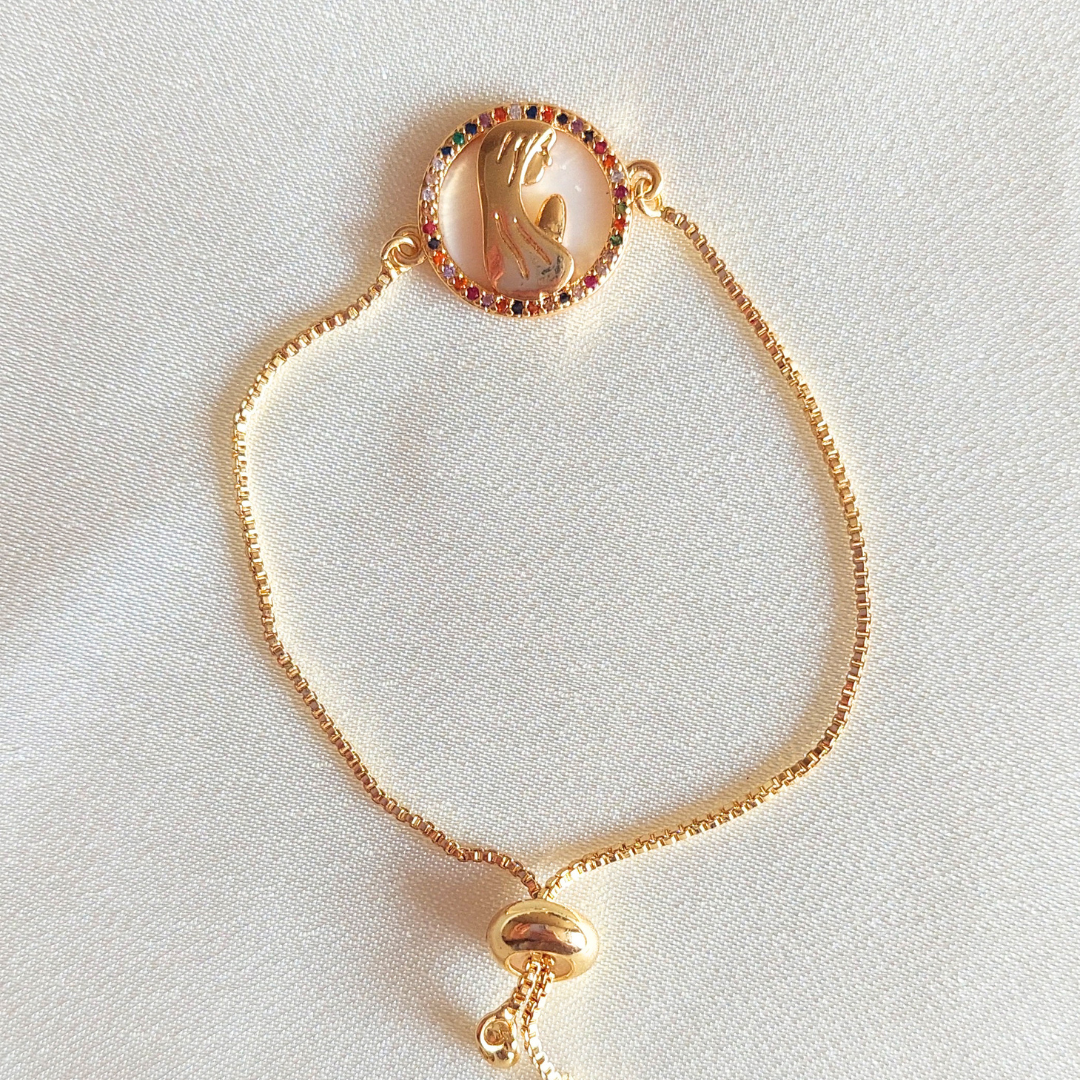 PULSERA VIRGEN NACAR CIRCONES DE COLORES